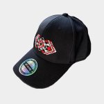 Black Māori pōtae cap showcasing Kapa Haka Makers' distinctive red Tāniko design embroidered onto the front.